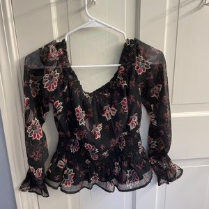 patrons of peace black top with red flowers